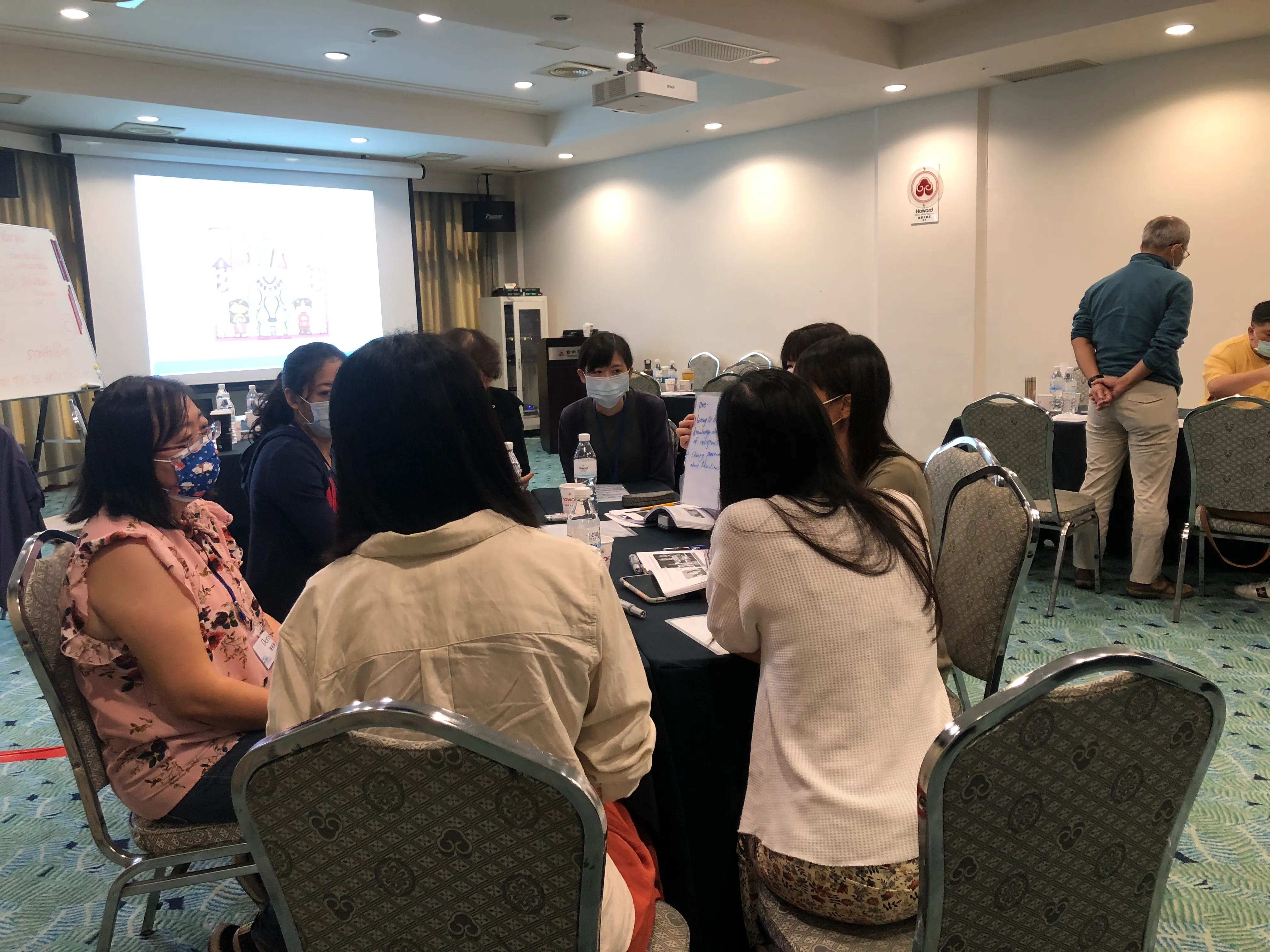 Teachers discussing new concepts and ideas